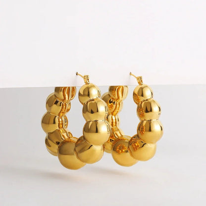 Boucles d’oreilles dorées vintage