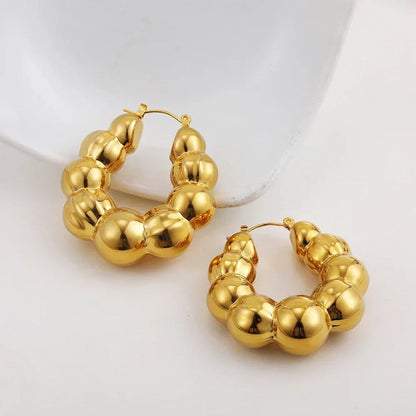 Boucles d’oreilles dorées vintage